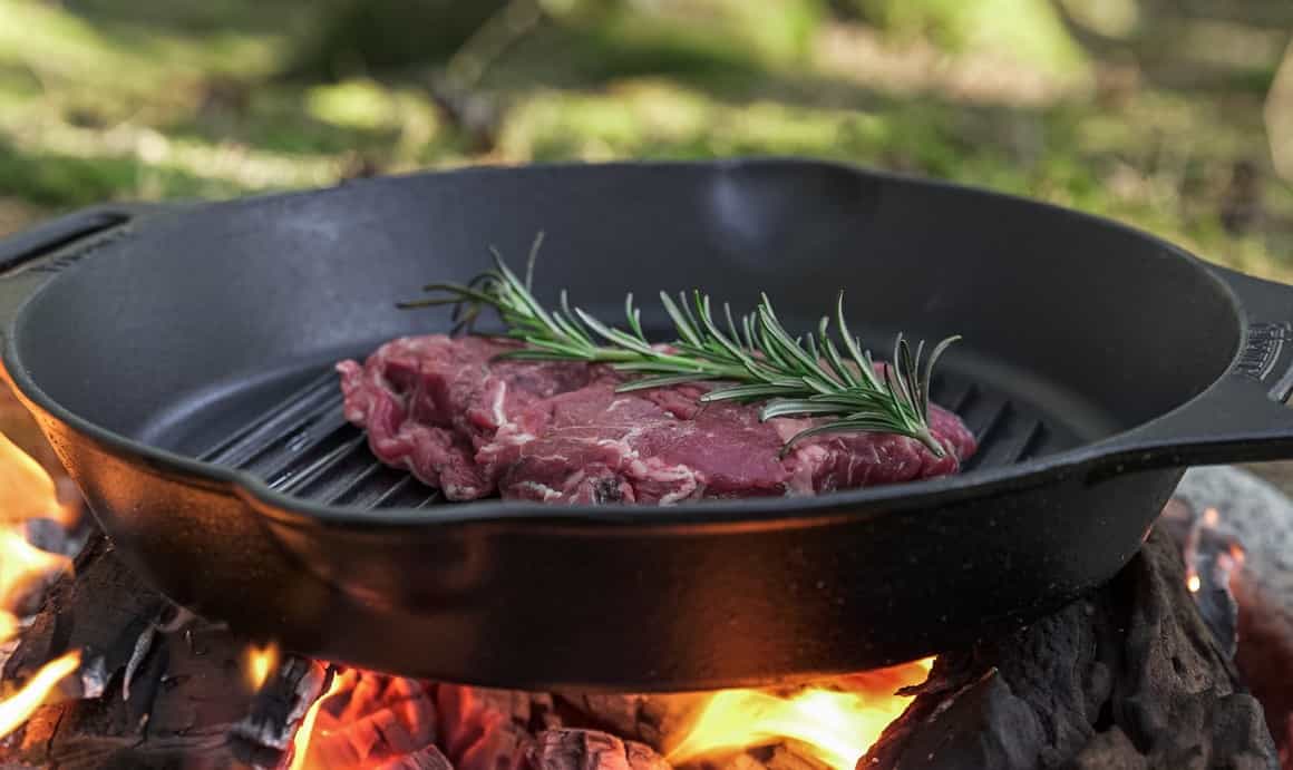 The Petromax grill pan gp30h-t with two handles is ideal for grilling meat